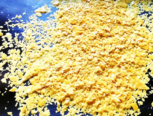 Photo of organic carnauba wax that we use in our organic deodorant.